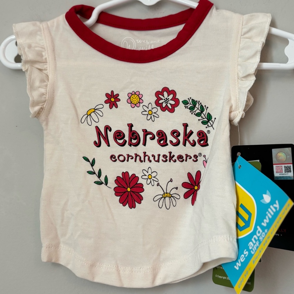 Size 6 months, Ruffle Cherry Red “Nebraska Cornhuskers” Pretty Flower Top